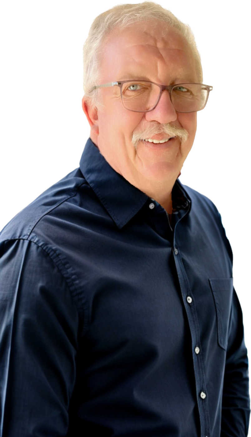 Bjarne “Conrad” Conradsen, smiling, in a navy shirt